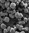 this is a scanning electron microscope image of a new material that self-assembles into polyhedra